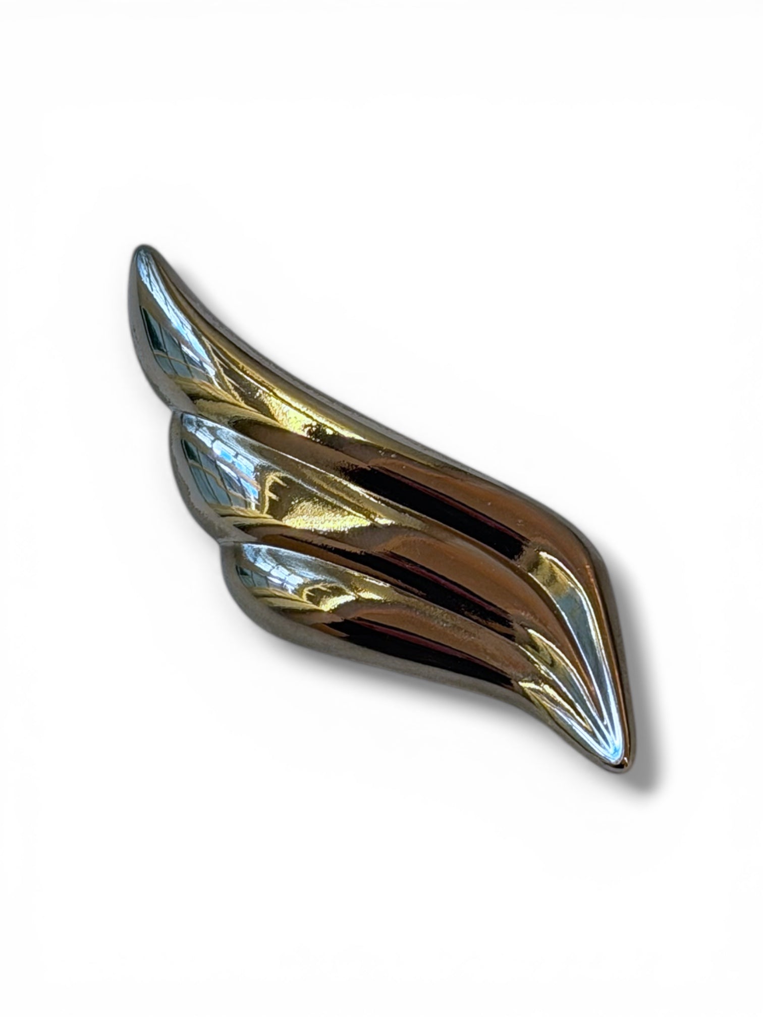 Thierry MUGLER broche métal argenté flamme