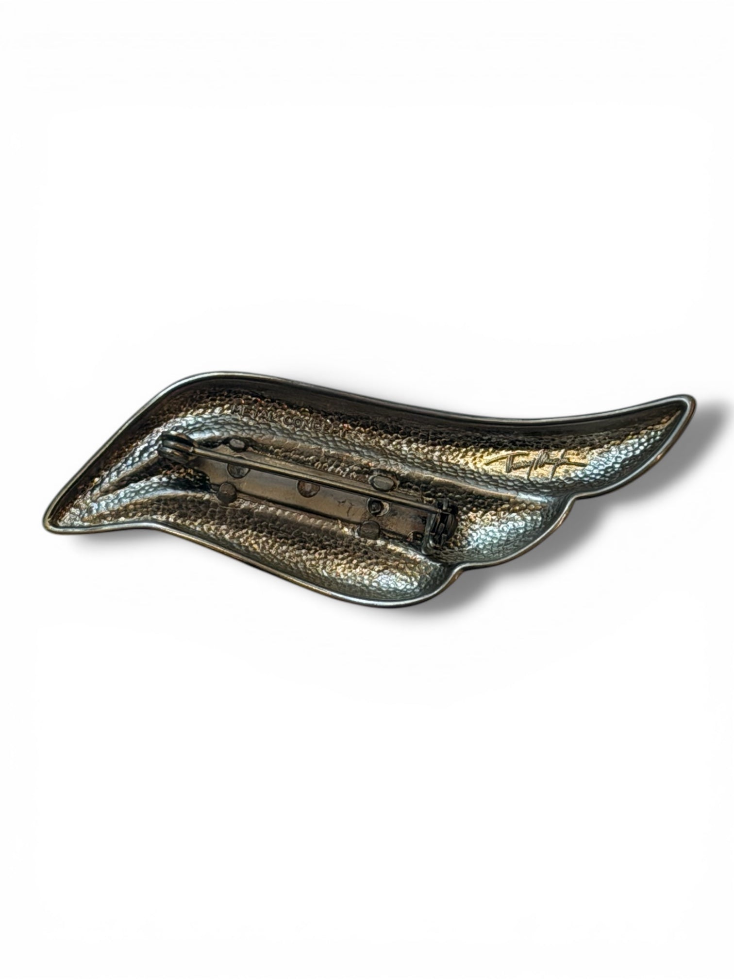 Thierry MUGLER broche métal argenté flamme