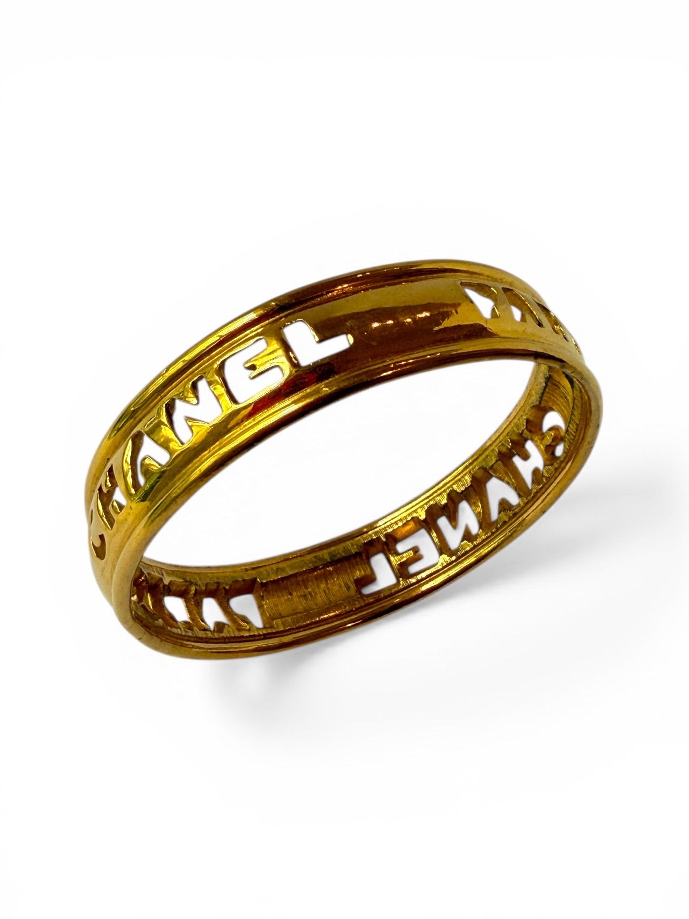Vintage Chanel Gold-Tone "CHANEL PARIS" Openwork Bangle