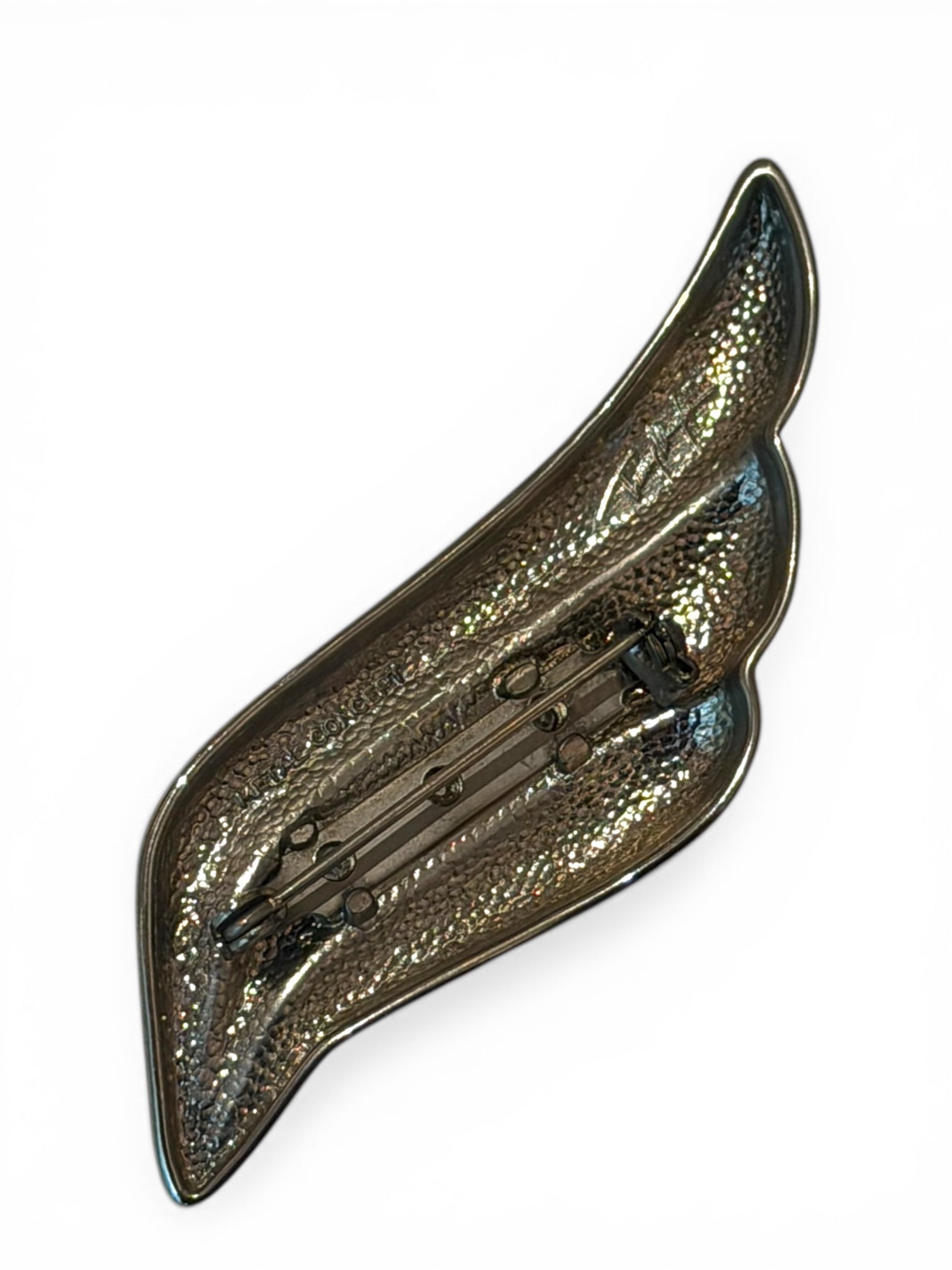 Thierry MUGLER broche métal argenté flamme