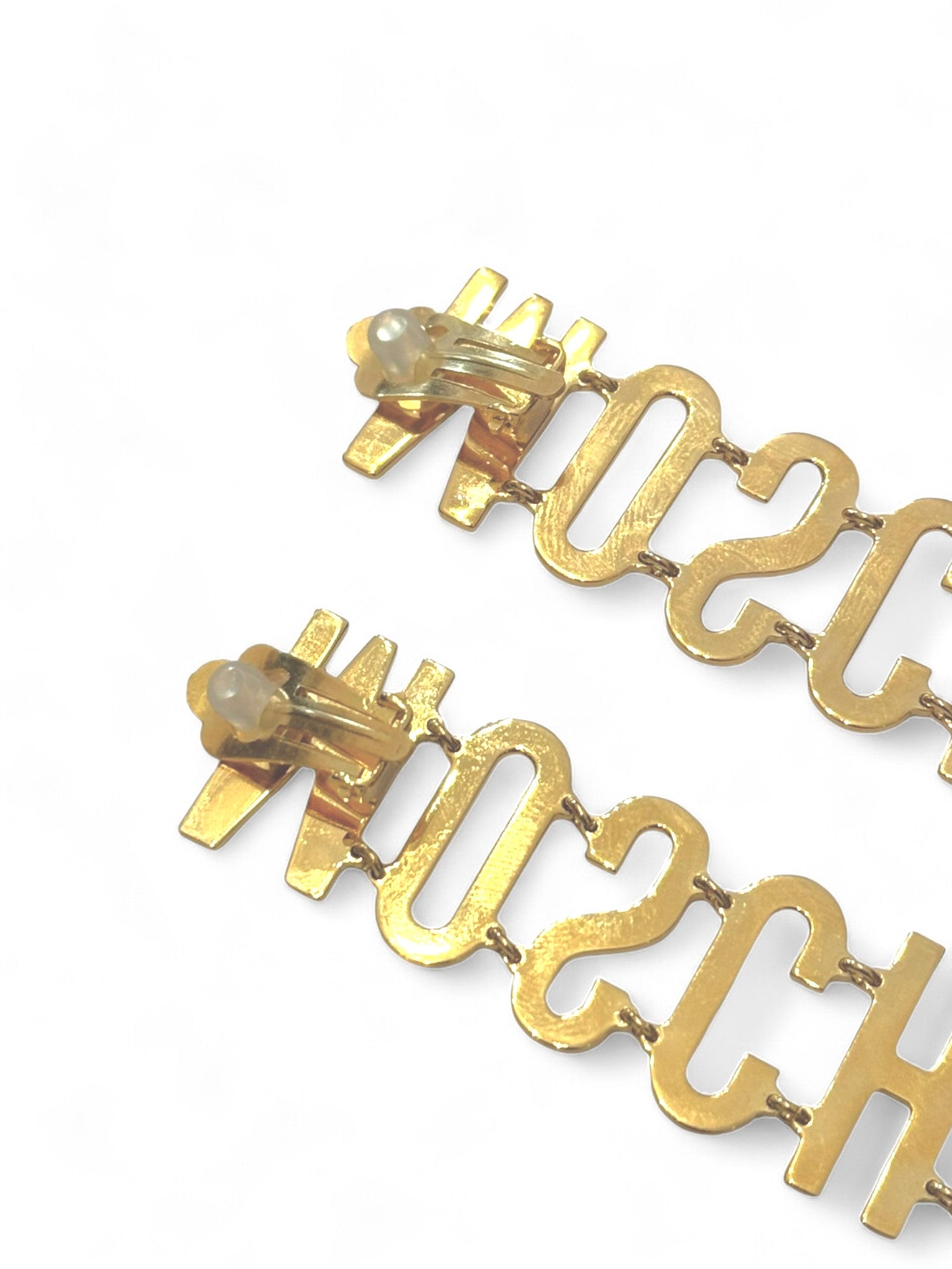 Boucles d'oreilles à clip pendentif emblématique